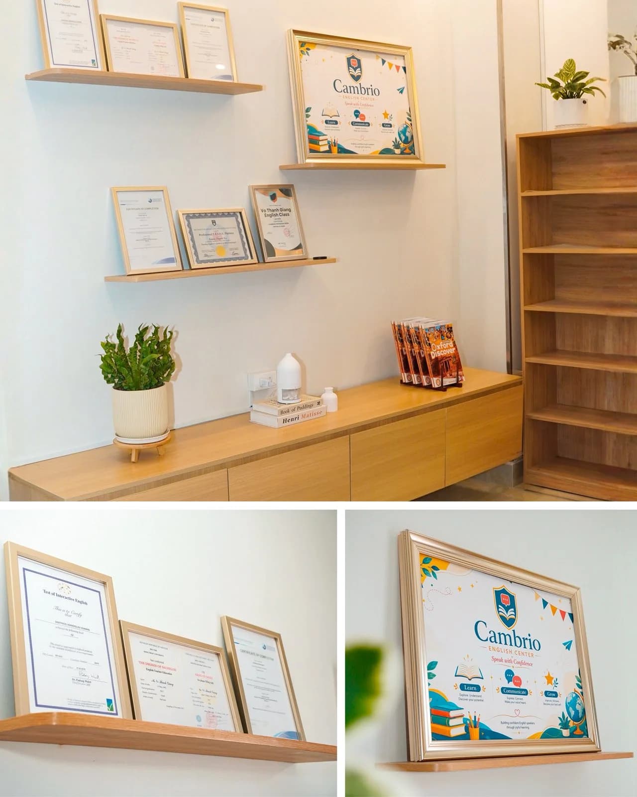 Shelf display of student certificates, achievement frames, and Oxford Discover reading books
